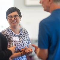 Julia VanderMolen talking with peers